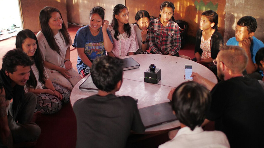 group of teens discussing celebrity