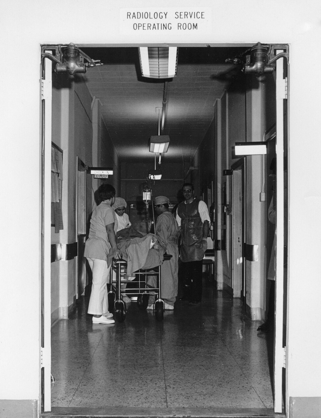Empty archive corridor with soft natural light